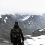 man standing at mountian